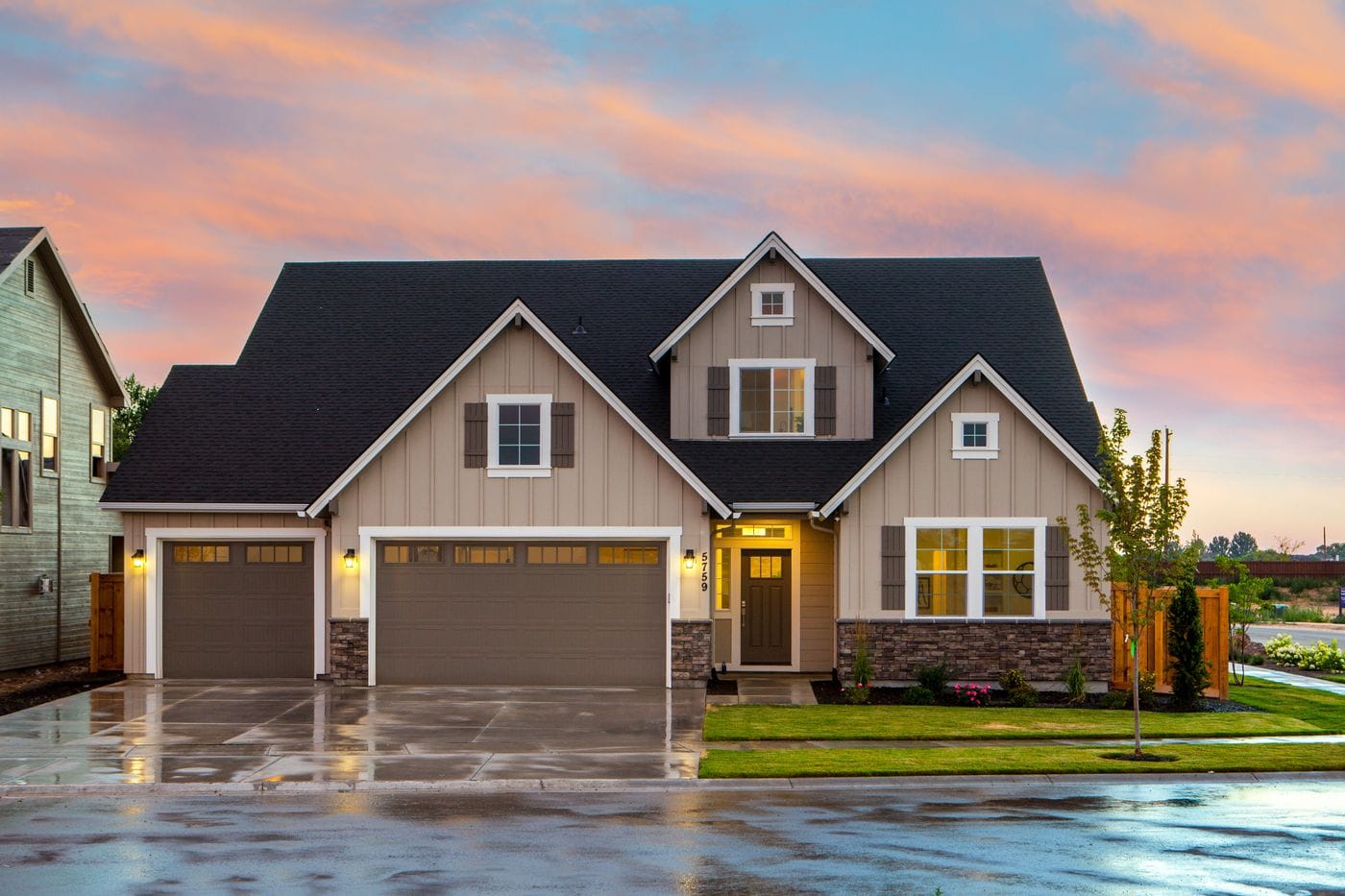 Two-story home with new exterior paint photographed at sunset in Port Jervis NY