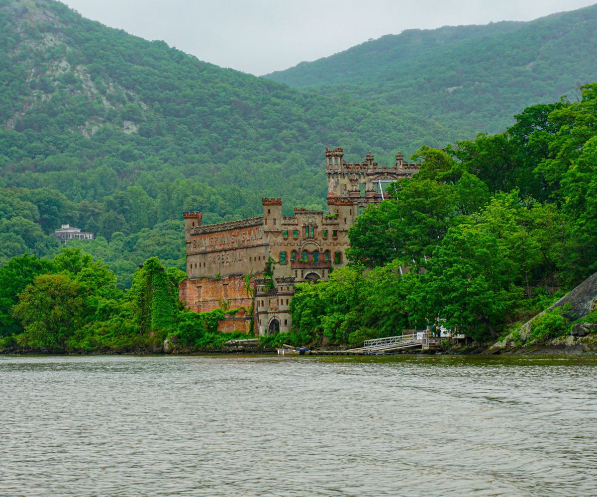 Bannerman Castle on Pollepel Island in the Hudson River, with the wooded Hudson Highlands behind it